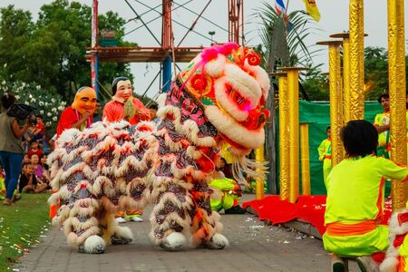BANGKOK, THAILAND - FEBRUARY 20: A group of people perform a lion dance during Chinese new year's celebrationのeditorial素材