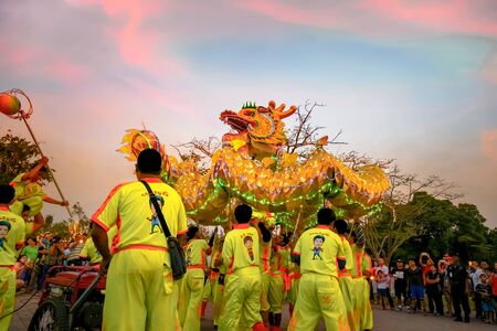 BANGKOK, THAILAND - FEBRUARY 20: A group of people perform a dragon dance during Chinese new year's celebrationのeditorial素材