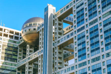 TOKYO, JAPAN - NOVEMBER 27 2015: Fuji T.V. headquarters, one of the most striking buildings in Japan. its' futuristic metallic clad building featuring a massive silver ball 32 metres in diameterのeditorial素材