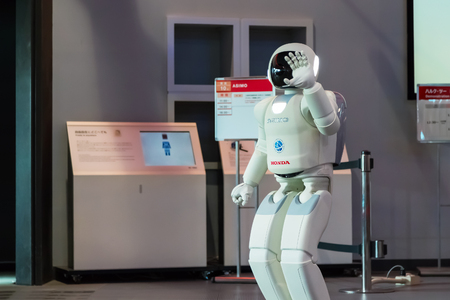 TOKYO, JAPAN - NOVEMBER 27 2015: Asimo, the humanoid robot created by Honda is presented at Miraikan, The National Museum of Emerging Science and Innovation in Odaiba areaのeditorial素材