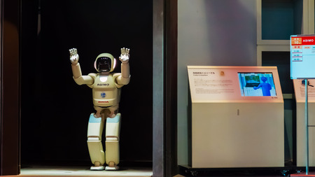 TOKYO, JAPAN - NOVEMBER 27 2015: Asimo, the humanoid robot created by Honda is presented at Miraikan, The National Museum of Emerging Science and Innovation in Odaiba areaのeditorial素材