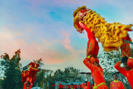 BANGKOK, THAILAND - JANUARY 14 2016: A group of people perform a lion dance during Chinese new year's celebrationのeditorial素材