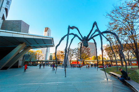 TOKYO, JAPAN - NOVEMBER 28 2015: Maman - a spider sculpture by Louise Bourgeois, situated at the base of Mori tower building in Roppongi Hillsのeditorial素材