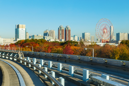 Motion blur of train moving inside tunnel in Odaiba, Tokyo, Japan                                                       TOKYO, JAPAN - NOVEMBER 27 2015: Cityscape from Yurikamome monorail sky train in Odaiba, the artificial island in Tokyoのeditorial素材
