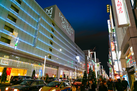TOKYO, JAPAN - NOVEMBER 28 2015: The Ginza is the Tokyo's most famous upmarket shopping, dining and entertainment district featuring numerous department stores, boutique, art galleries, restaurants and cafeのeditorial素材
