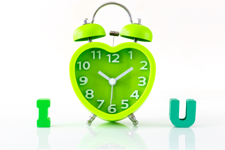 Heart Shaped Clock Wooden Alphabets for Valentin's Conceptの写真素材