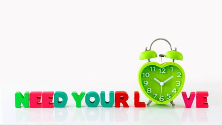 Heart Shaped Clock Wooden Alphabets for Valentin's Conceptの写真素材