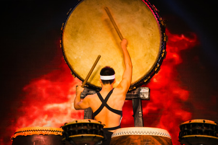 BANGKOK, THAILAND - FEBRUARY 2 2016: Unidentified group of Japanese students perform Japanese traditional "Taiko" drum on a statge at Japan Expo, held in Bangkokのeditorial素材