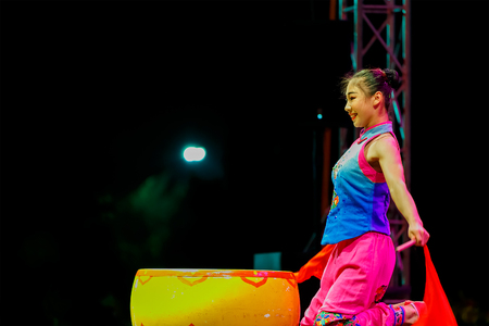 BANGKOK, THAILAND - FEBRUARY 20 2016: Jinan acrobatic troupe performing in Rama IX Park in a Chinese new year Celebration. The group is one of the best acrobatic performance in Chinaのeditorial素材