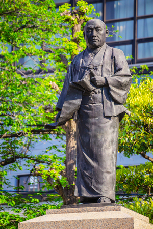 TOKYO, JAPAN - APRIL 20 2018: Statue of Oishi Kuranosuke, the leader of 47 loyal ronin, one of the most popular Japanese historical stories at Sengakuji Templeのeditorial素材