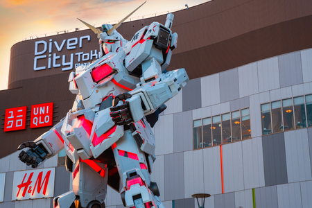 TOKYO, JAPAN - APRIL 20 2018: Full-size Mobile suit  RX-0 Unicorn Gundam replica from the Mobile Suit Gundam Unicorn series at  Diver City Tokyo Plaza - a Shopping mall in Odaiba areaのeditorial素材