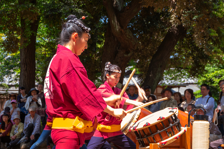 TOKYO, JAPAN - APRIL 29 2018: Unidentified group of women perform Japanese Taiko drum in Bunkyo Azalea Festival (Tsutsuji Matsuri) at Nezu Shrineのeditorial素材