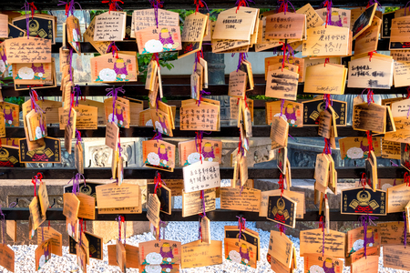 TOKYO, JAPAN - APRIL 29 2018: Ema are small wooden plaques which Shinto worshippers write their prayers then leave hanging up at the shrineのeditorial素材