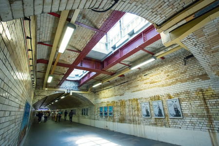 London, UK - May 20 2018: Unidentified people travel through underground train network at South Kensington station subway in London London, UK - May 20 2018: Unidentified people travel through underground train network at South Kensington station subway in London