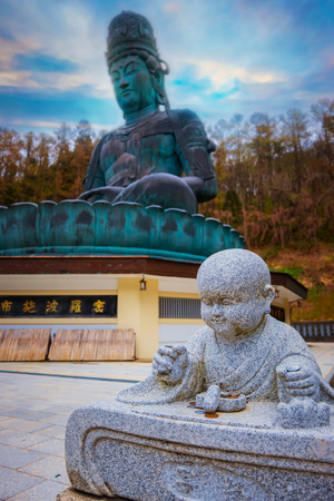 The Big Buddha at Seiryuji Temple in Aomori Prefecture. AOMORI, JAPAN - APRIL 24 2018: The big Buddha at Seiryuji temple completed in 1984, the bronze Buddha with meditation posture is totally 21.35 meters tallのeditorial素材