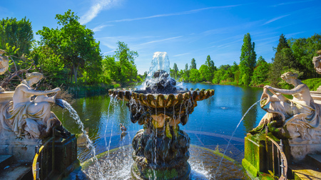 The Italian gardens at Kensington Gardens in London, UK London, UK - May 14 2018: The Italian gardens created in 1860 in Hyde Park area  believed to have been a gift from Prince Albert to his beloved Queen Victoria.のeditorial素材