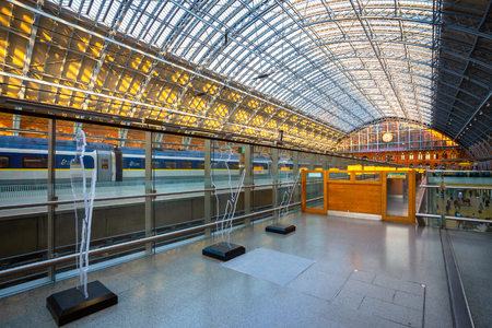 London, UK - May 14 2018: St Pancras station is a central London railway terminus. It is the terminal station for Eurostar continental services from London to France, Belgium and Netherlands London, UK - May 14 2018: St Pancras station is a central London railway terminus. It is the terminal station for Eurostar continental services from London to France, Belgium and Netherlands