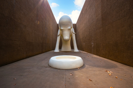 Tokyo, Japan - April 22 2018:  Aomori Dog Statue a gigantic white dog over 8.5 meters tall at The Aomori Museumのeditorial素材