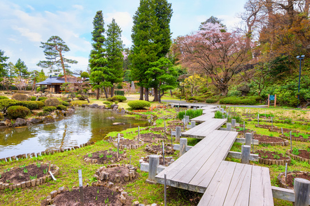 Hirosaki, Japan - April 23 2018: The Fujita Memorial Japanese Garden built in 1919 in Japanese traditional lanscpe style garden, named after a local business man, Fujita Kenichiのeditorial素材