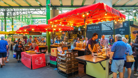London, UK - May 23 2018: Unidentified people at Borough Market in Southwark, one of the largest and oldest food markets in London, today the market mainly sells speciality foods to the publicのeditorial素材