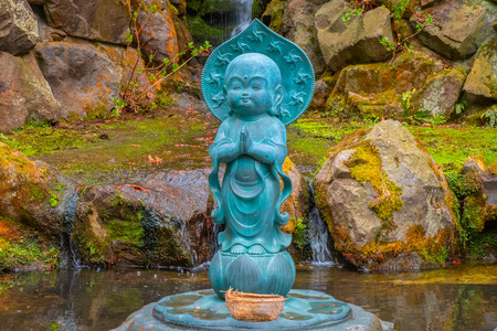 Aomori, Japan - April 24 2018: Buddha statues at Seiryu-ji Buddhist temple founded by Ryuko Oda in 1982, home to largest seated bronze Buddha statue, Showa Daibutsu, in Japanのeditorial素材