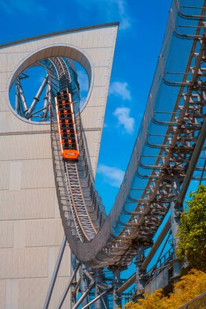 Tokyo, Japan - April 28 2018: Tokyo Dome City includes an amusement park and Tokyo Dome City Attractions occupies the former Korakuen Stadium and includes a roller coaster and a hubless Ferris wheelのeditorial素材