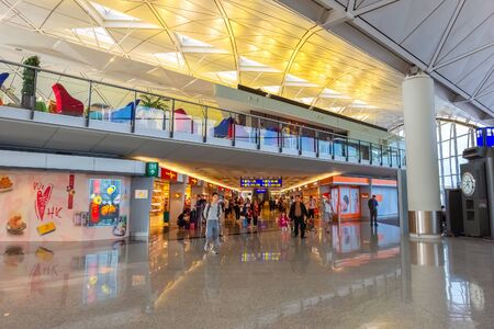Hong Kong - April 30 2018:  Unidentified people at Hong Kong International Airport where it's the world's busiest cargo gateway and one of the world's busiest passenger airportsのeditorial素材
