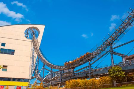 Tokyo, Japan - April 28 2018: Tokyo Dome City includes an amusement park and Tokyo Dome City Attractions occupies the former Korakuen Stadium and includes a roller coaster and a hubless Ferris wheelのeditorial素材