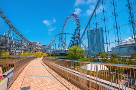 Tokyo, Japan - April 28 2018: Tokyo Dome City includes an amusement park and Tokyo Dome City Attractions occupies the former Korakuen Stadium and includes a roller coaster and a hubless Ferris wheelのeditorial素材
