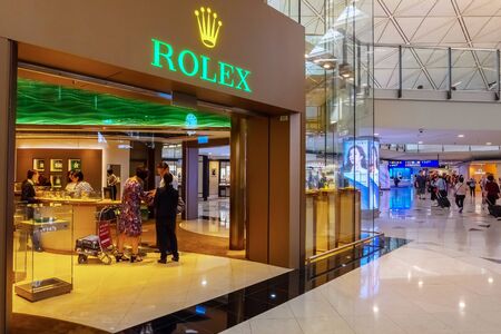 Hong Kong - April 30 2018: Rolex gallery at Hong Kong International Airport where it's the world's busiest cargo gateway and one of the world's busiest passenger airportsのeditorial素材