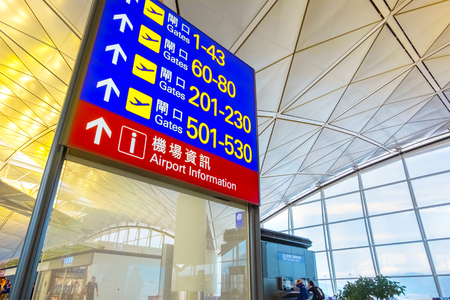 Hong Kong - April 30 2018:  Unidentified people at Hong Kong International Airport where it's the world's busiest cargo gateway and one of the world's busiest passenger airportsのeditorial素材