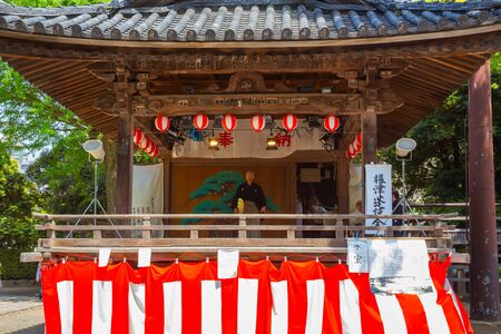 Tokyo, Japan - April 29 2018: Unidentified people perform Japanese fan dance in Bunkyo Azalea Festival (Tsutsuji Matsuri) at Nezu Shrineのeditorial素材