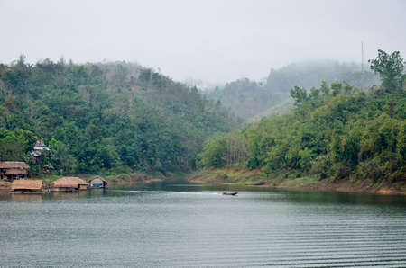 Life Mon, waterfront homes, mountain, river, songkalia river, Sangkhlaburi Kanchanaburi, Thailandの写真素材