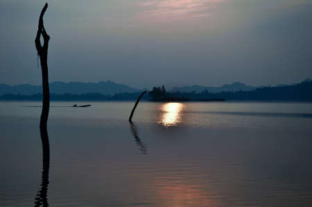 Boats, evening light, reservoir, Khao Laem National Park, Kanchanaburi, Thailandの写真素材