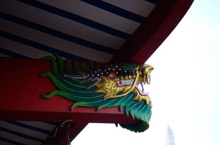 beautiful church dragon wall in Chinese temple of Thailandの写真素材
