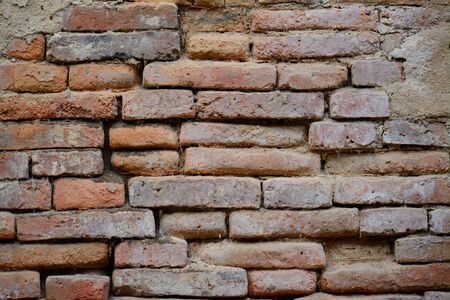beautiful hand made ancient brick wall in Thailand