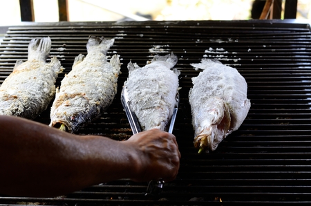 sailty grilled barramundi or Asian seabass (Lates calcarifer) at Thailand marketの写真素材