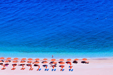 people sunbathing on a paradise Apella beachの写真素材