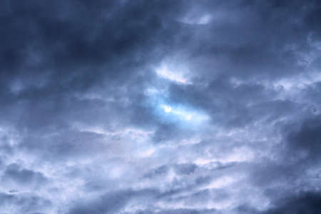 sun penetrating cloudsの写真素材