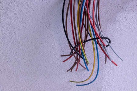 a bunch of different cables looking from wall