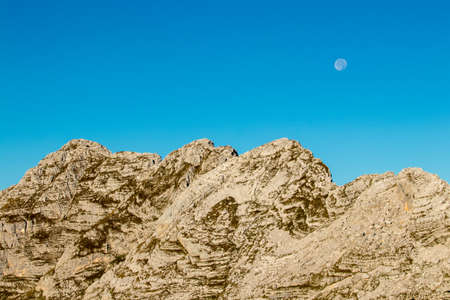 mountain range Å piÄje with moon behindの写真素材