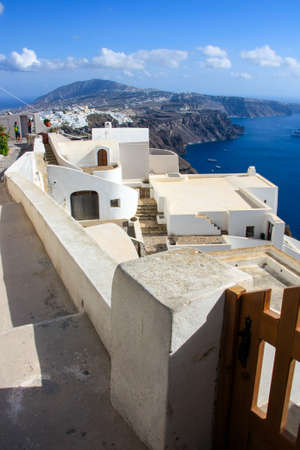 look from village Oia toward hillsの写真素材