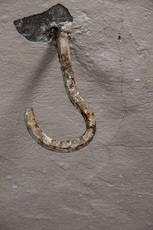 old rustic hook on ceiling