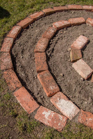 2nd layer for spiral herb garden with soil close upの写真素材