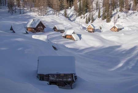 Mountain cabins in Dedno polje, Bohinj, winter time