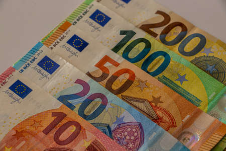 A 200, 100, 50, 20, 10 euro notes on table