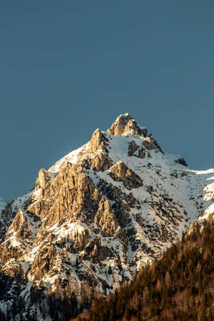 Sunlit mountain peak in Bohinj