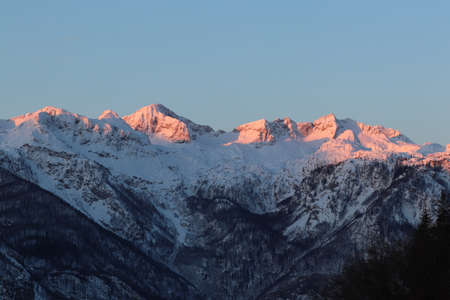 Sunlit mountain range in Bohinj