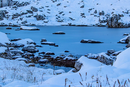 Frozen glaciers lake during dayの写真素材