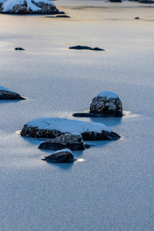 Frozen glaciers lake during dayの写真素材